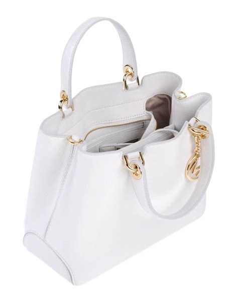 white Michael Kors purses